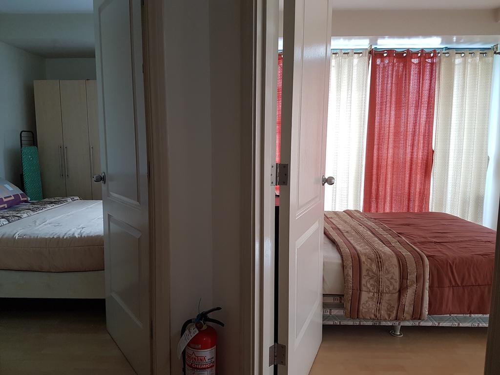 Ortigas 2 Bedroom Corner Unit With 2 Queen Across Shangrila Manila Esterno foto